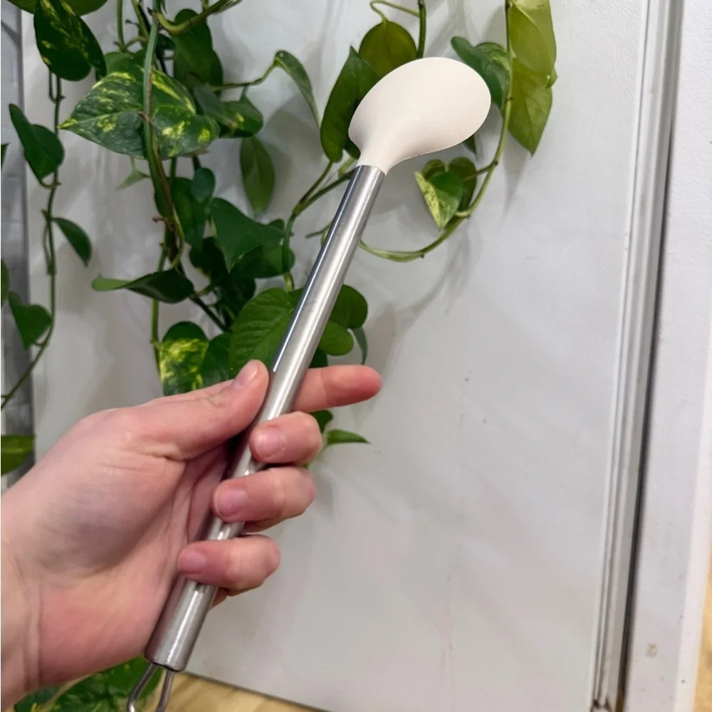 Elegant Silver and White Kitchen Spoon